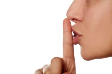 depositphotos_70564859-stock-photo-finger-on-lips.webp